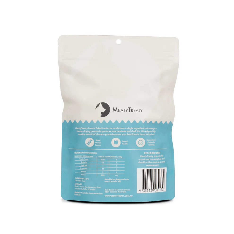 The back of a blue and white packet of Dog or Cat treats by Meaty Treaty containing Crocodile